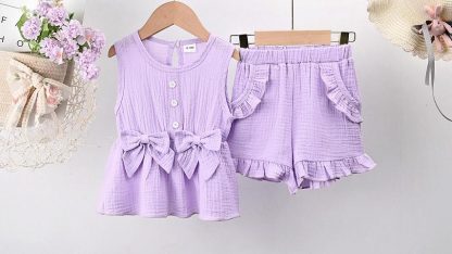 "Charming Summer Outfit for Toddler Girls: Bow-Adorned Sleeveless Top and Ruffle Shorts Set" - Image 7